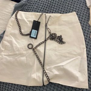 Carmar white denim skirt w chains